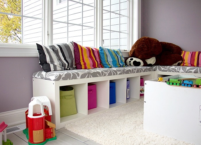 Window seat with pillows and toys #playroom