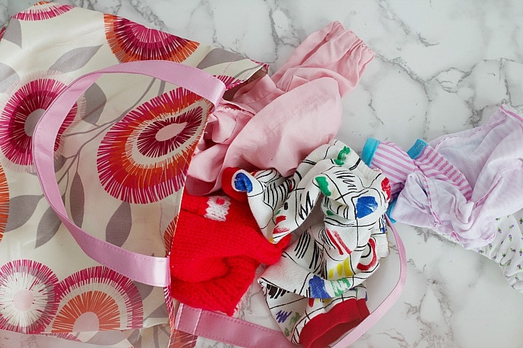 Learn how to get your home organized with items all found at The Dollar Store, with these easy organizing hacks created by professional organizer. Everything from kids clothes to doll accessories to purses to games! #organized #dollarstore