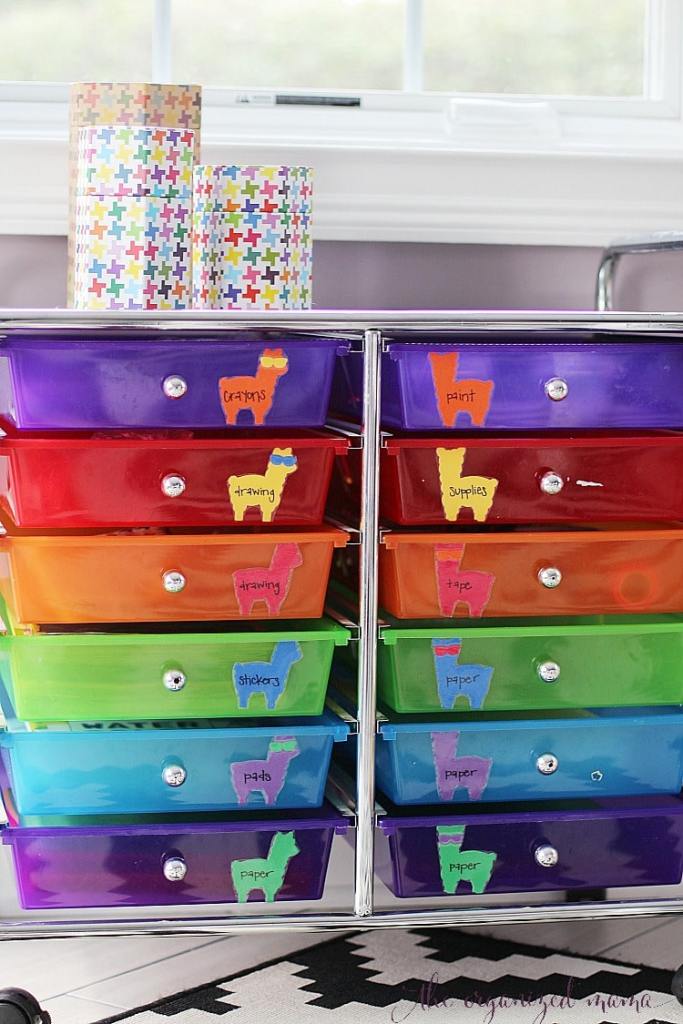 colorful drawers with colorful llama labels on each individual drawer