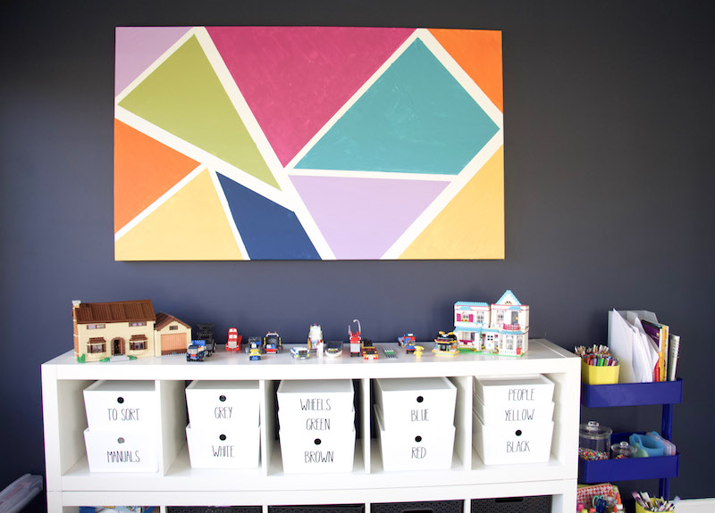playroom decor with painting and lego storage