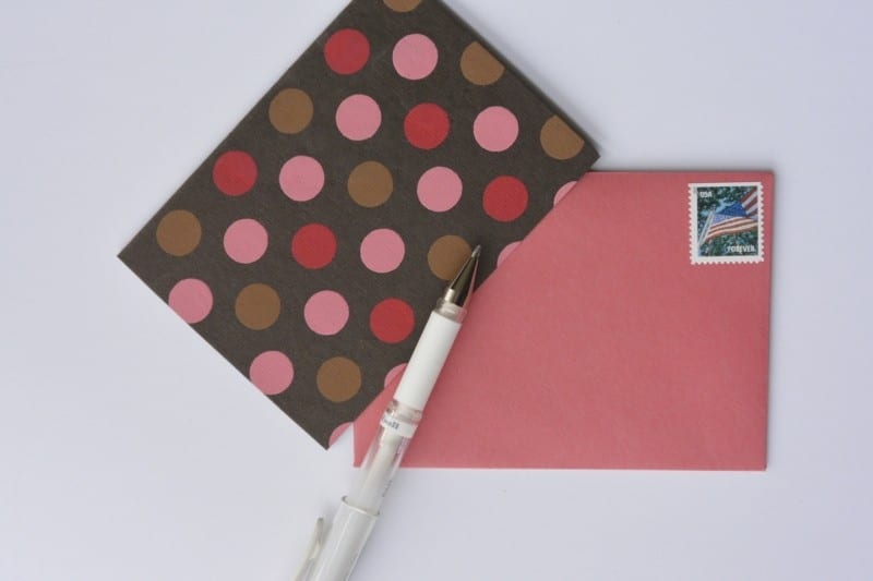 thank you card with stamp and pen to demonstrate how to write thank you notes quickly