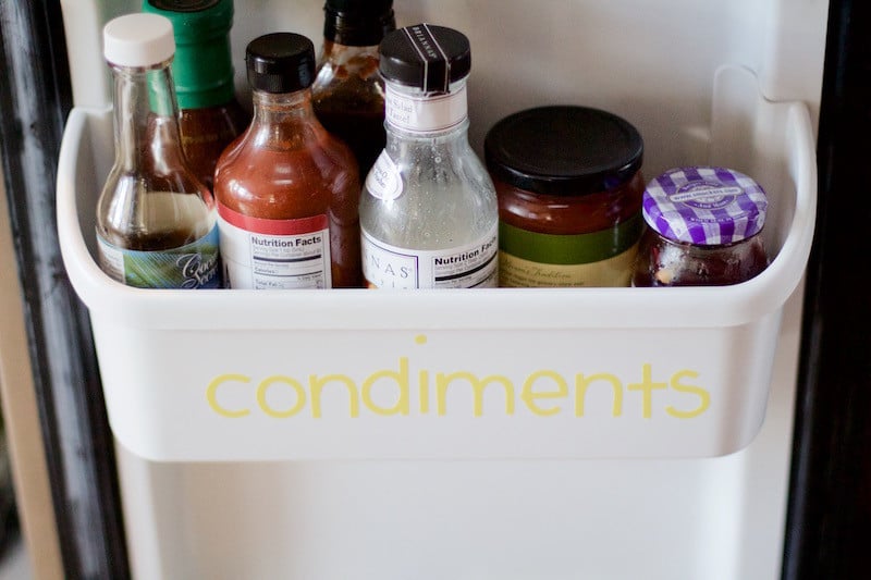 Condiments in fridge door with label. #kitchenorganization
