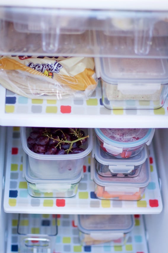 Fridge organized with clear containers and lined shelves. #kitchenorganization