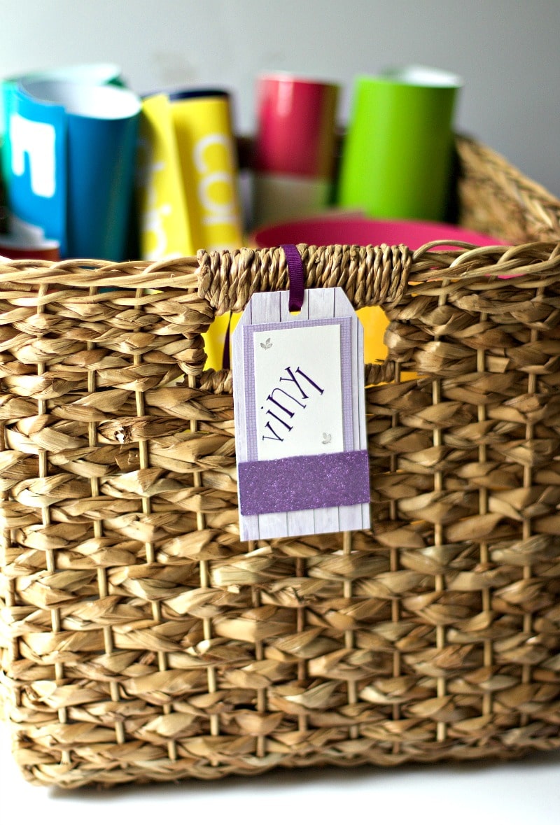 Woven basket labeled and filled with vinyl #organize #craftsupplies