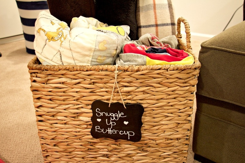 Basket filled with blankets and chalk label: "Snuggle Up Buttercup" #blankets