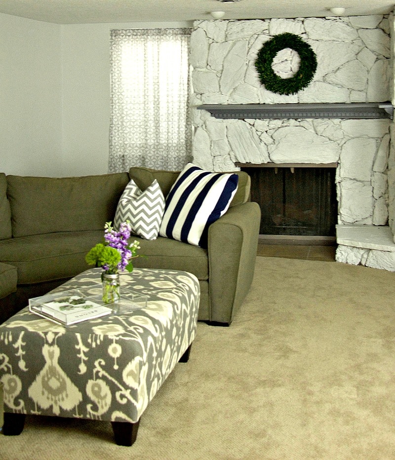Couch Ottoman and Fireplace