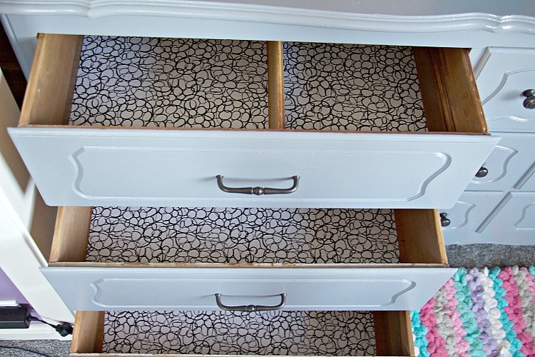lining drawers kids bedroom with three drawers opened and empty