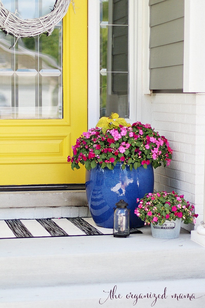 yellow door blue planter patio decorating ideas for summer