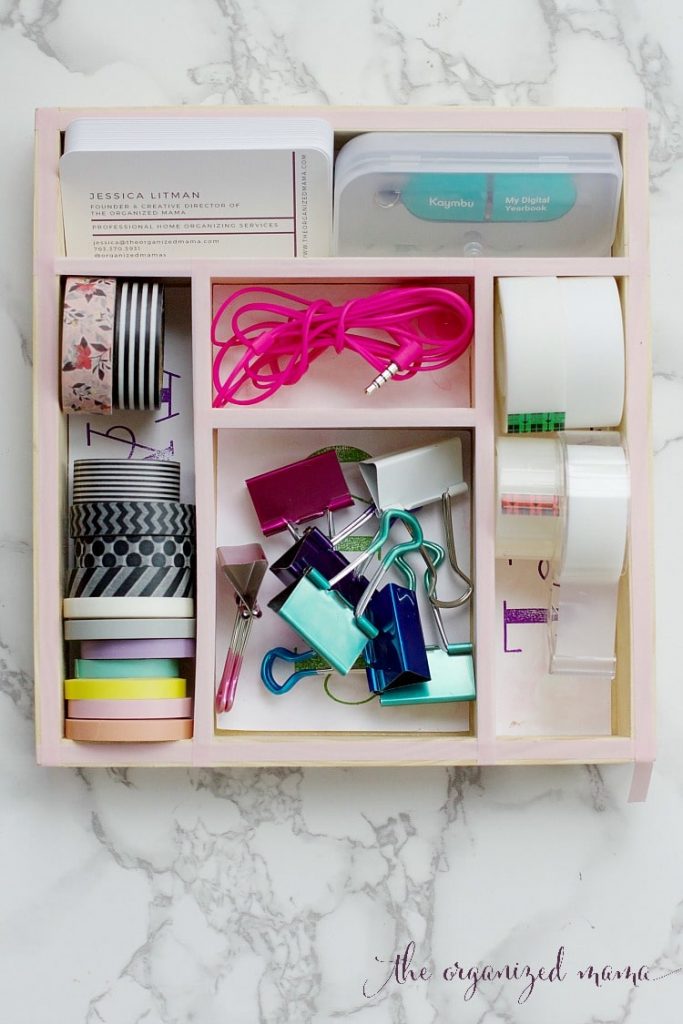 Get that desk drawer organized with custom drawer organizers that you can make yourself! Use kids stamp boxes, paper, and decorative stamps to create one-of-a-kind custom drawer organizers! #drawerorganizer #organized