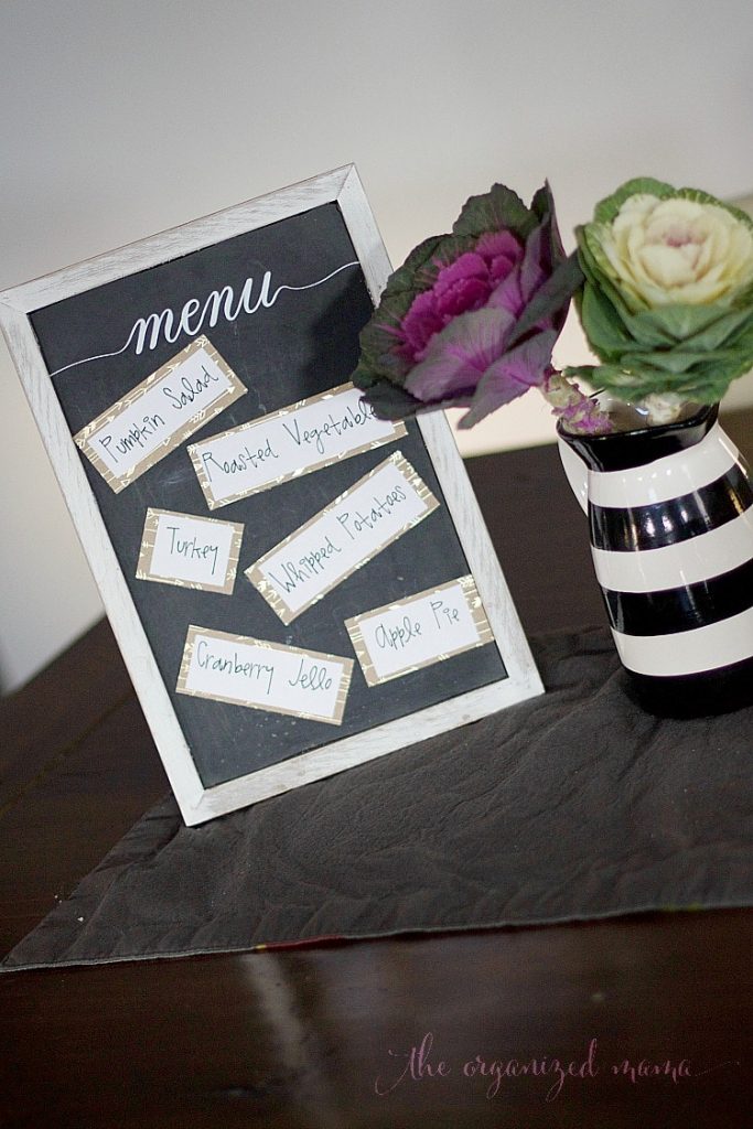 Add character to your Thanksgiving table with these inexpensive Thanksgiving decor ideas! Use repositionable stickers for a handwritten menu and more! #thanksgiving #decor