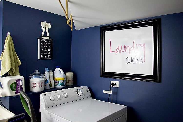 These budget-friendly laundry room organization ideas for small spaces will help anyone with a tiny laundry area get organized and make it look pretty at the same time! #laundryroom #organize #decor