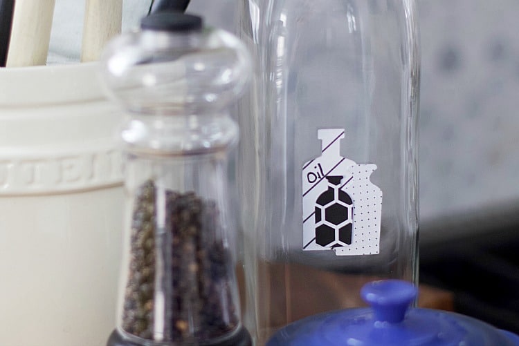 Give your oil bottles labels that will last! This easy tutorial will show you how to add labels to oil bottles so you know what is in each bottle. #oilbottle #labels