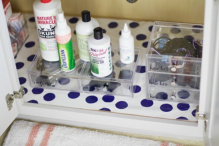 Professional organizer shares tips for how to create under sink storage for kids that will grow with them by breaking down tips for you! #organized #bathroom #kids