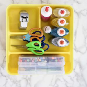 Learn tips for setting up an art cart for kids that makes it both accessible and easy to maintain. Breaking down how to create cart for kids of all ages. #artcart #organized