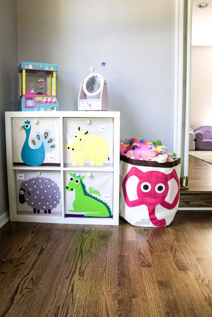 playroom with The Container Store cubes and 3 Sprouts bins holding different categories of toys #organized