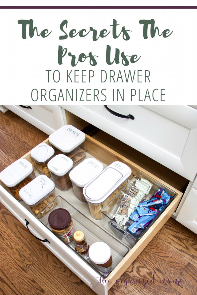 Open kitchen drawer with drawer organizers inside and text overlay that says the secrets the pros use to keep drawer organizers in place #organized #kitchen