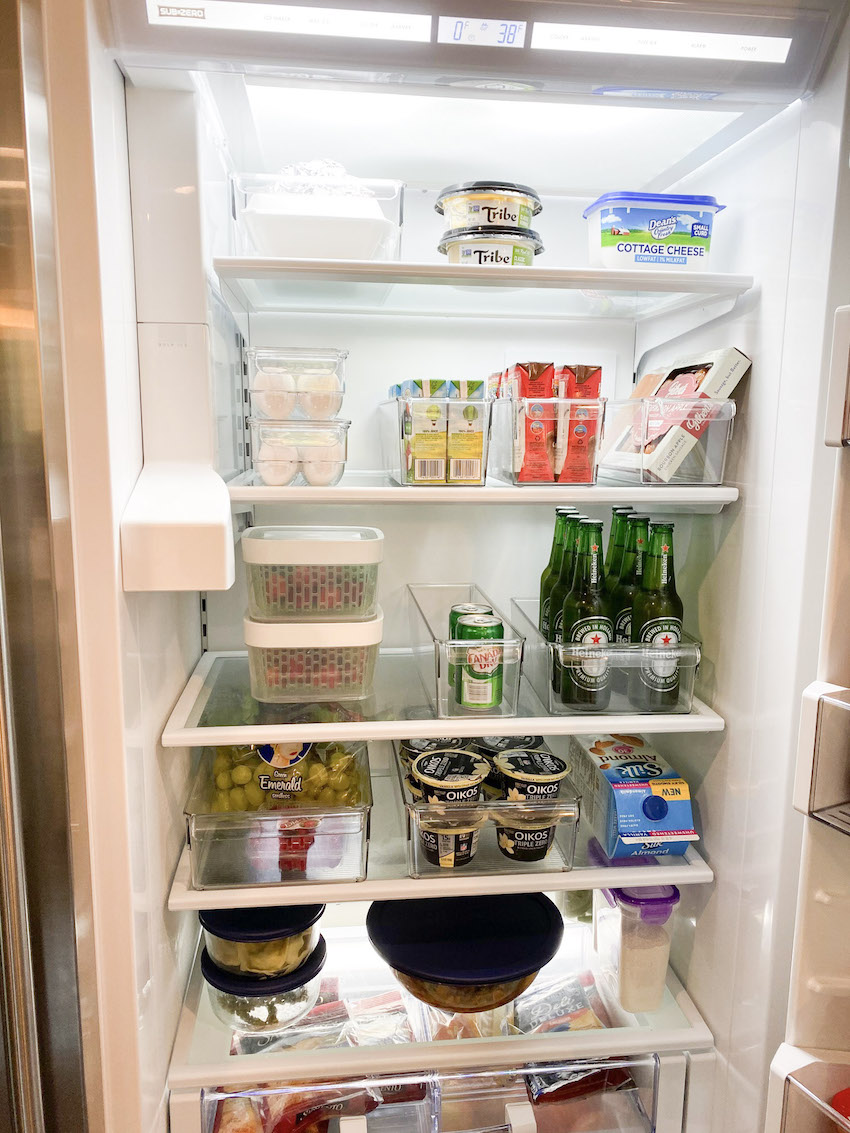 full fridge organization with the container store