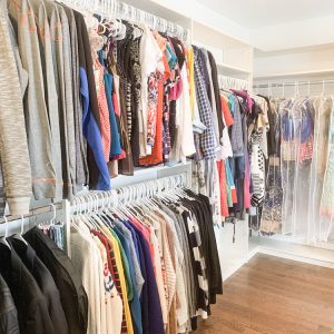 closet with hanging clothing