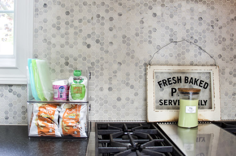 setting up a snack station for kids on countertop