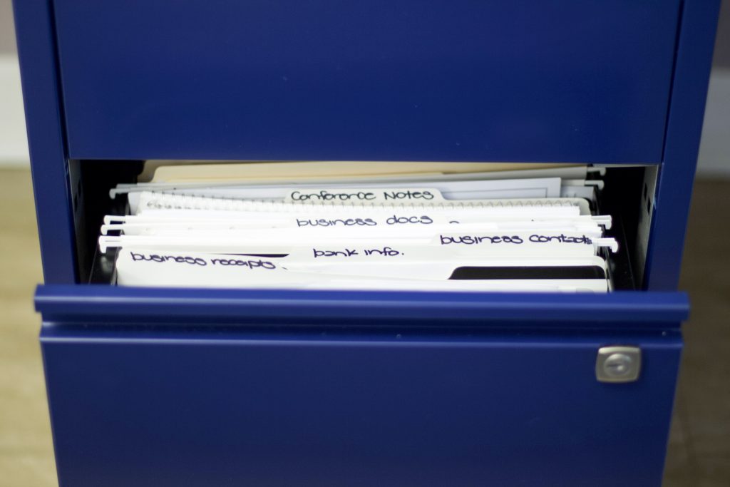 Open file cabinet to show organized paper with no clutter #declutter #organizedpaper