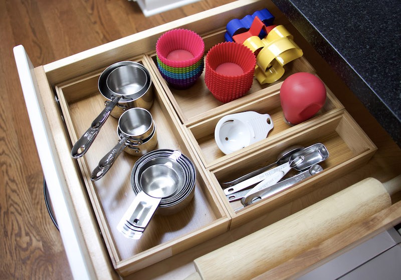 Organized kitchen supplies in a drawer