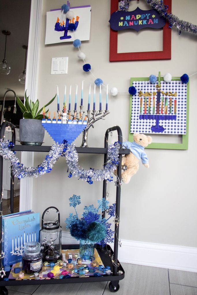 hanukkah decor on a bar cart