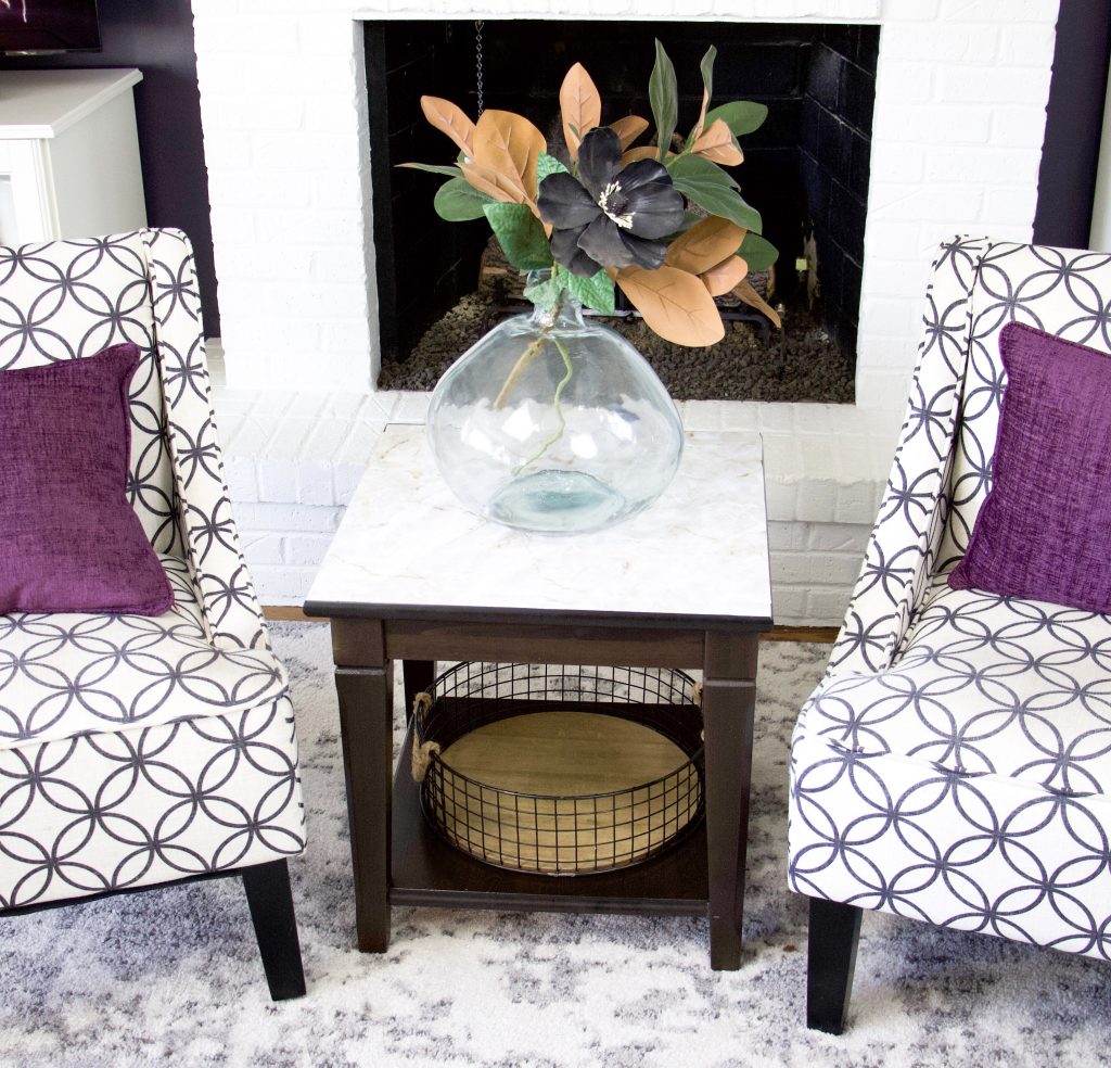 chairs and end table with marble top