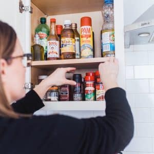 decluttering kitchen cabinets to make it an organizing habit