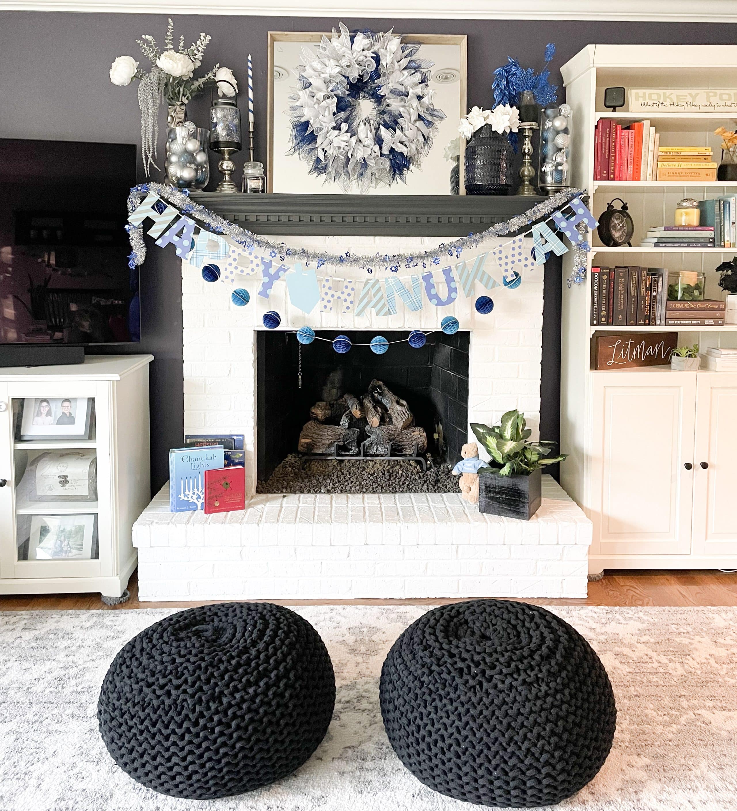 family room decorated for hanukkah with blue, silver and white decor