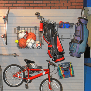 organized garage with items hanging on wall space