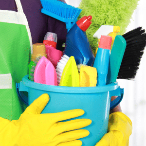 bucket of cleaning products for spring cleaning tips