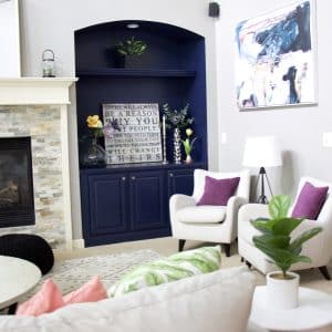living room with navy blue shelving