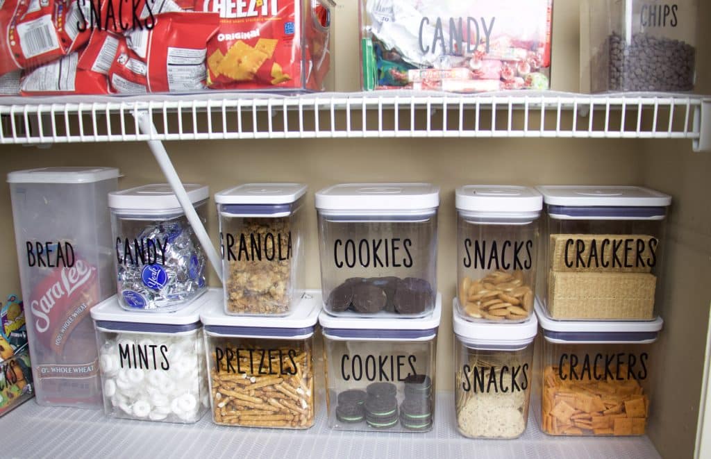 Personalized bins to help organize a pantry. 