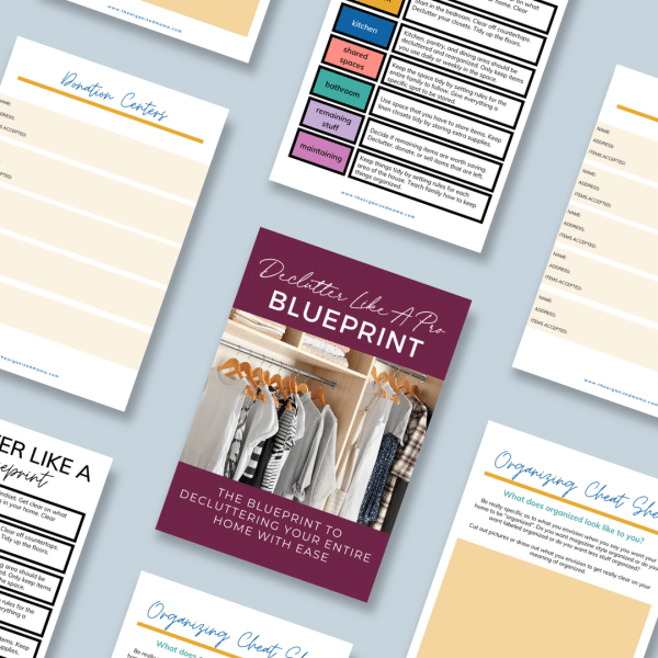 flatlay of worksheets inside workbook declutter like a pro blueprint
