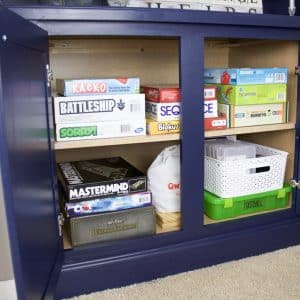 board games stored in cabinet