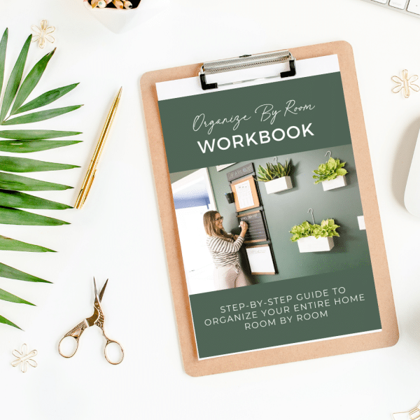 Organizing By Room Workbook on clipboard